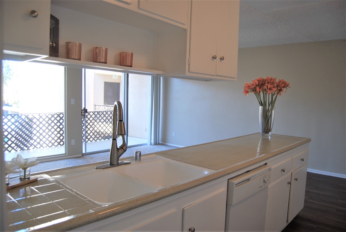 Kitchen sink with porcelain countertop, alternate view.